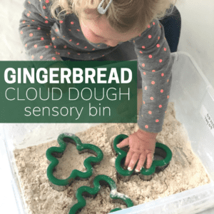 little girl playing with gingerbread cloud dough