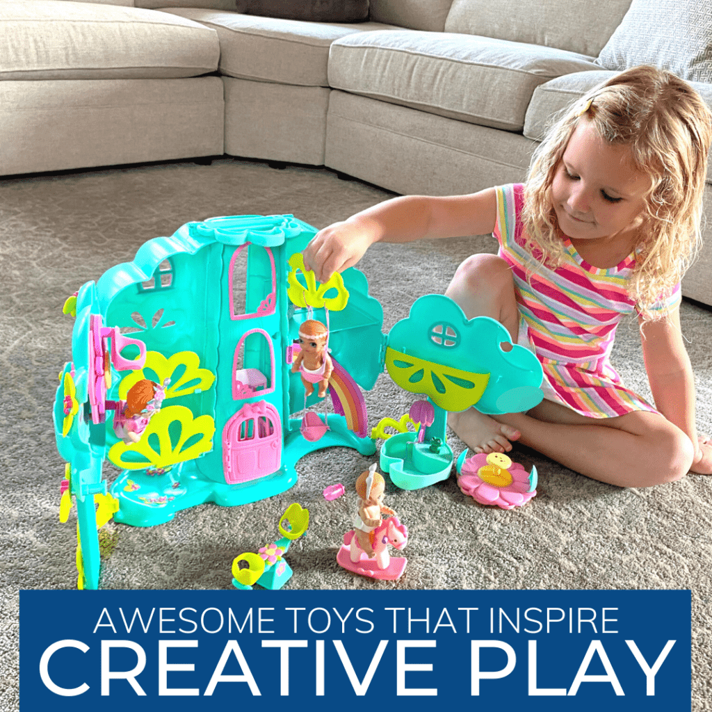 Girl playing with a Baby Born treehouse with three small baby doll toys.